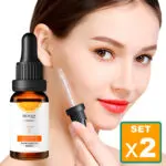 Set x2 Serum Vitamina C Bioaqua 100ml con modelo aplicando en rostro.