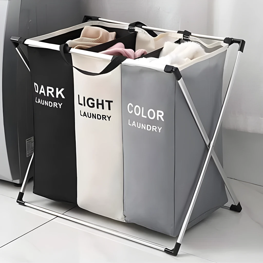 Cesto de ropa plegable para el hogar con divisiones para ropa oscura, clara y de color.