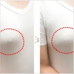 Cubre seno circular de silicona en camiseta blanca, realza el busto.