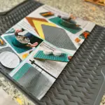 Silicona multiusos de cocina Gourmet gris, ideal para secar platos y proteger superficies.