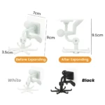 Gancho giratorio multiusos cabeza blanco y negro para colgar objetos, se expande.