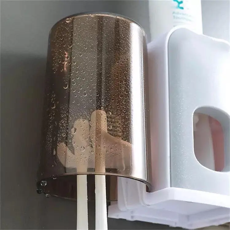 Soporte doble para cepillos de dientes con dispensador, diseño moderno y práctico para tu baño.