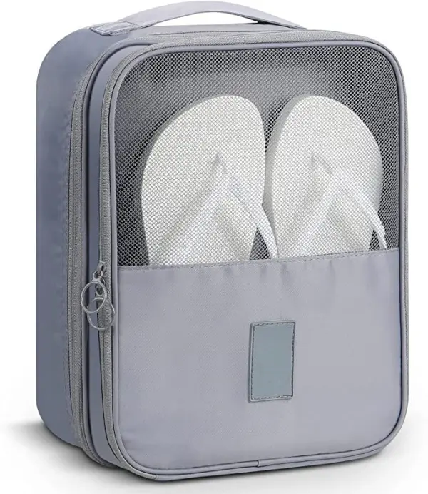 Bolso de viaje gris portátil para guardar zapatos o ropa, con compartimento superior de malla y cierre.