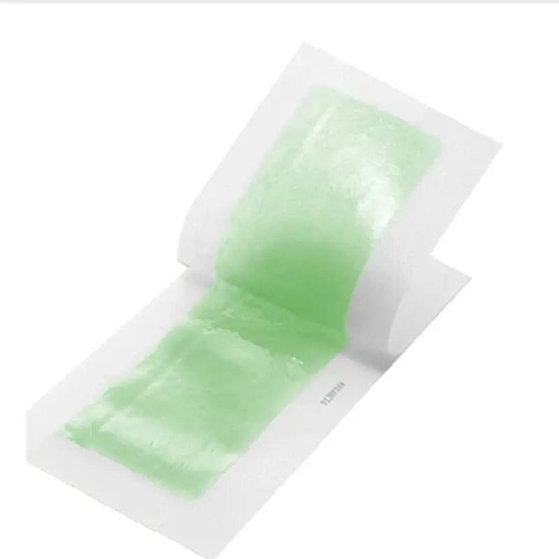 Parches depilatorios Hanei verdes, listos para usar, para una depilación suave y efectiva.