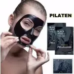 Mujer aplicando mascarilla negra Pilaten para puntos negros, piel limpia y radiante.