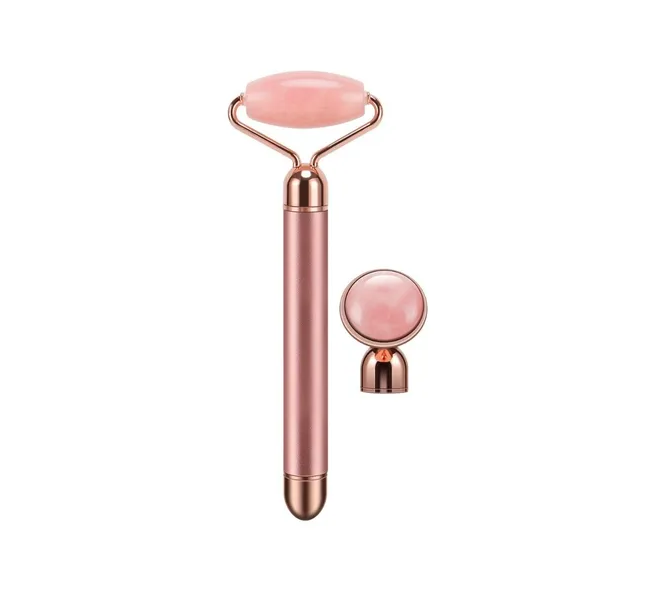 Masajeador facial Flawless Contorn antiedad con rodillo de cuarzo rosa vibratorio y accesorio.