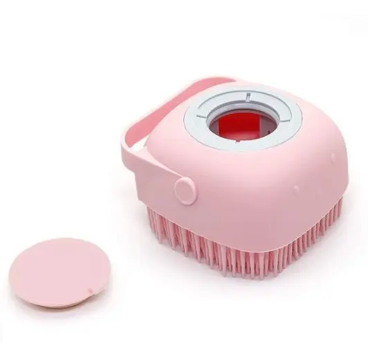 Cepillo corporal de baño en silicona suave rosa con tapa desmontable para gel.