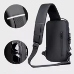 Bolso canguro antirrobo negro con bolsillo para gafas y detalles reflectantes.