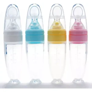 Cuchara biberón para papillas de bebé en colores blanco, azul, amarillo y rosa.
