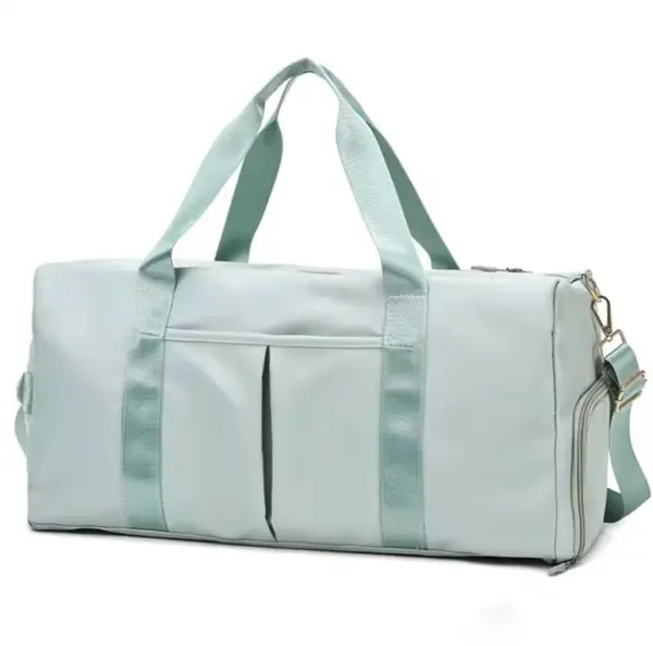 Bolso de viaje o gym impermeable color menta con asas y correa ajustable, con bolsillos frontales.