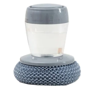 Cepillo dispensador de jabón para lavaplatos con esponja gris y recipiente transparente para lavar platos.