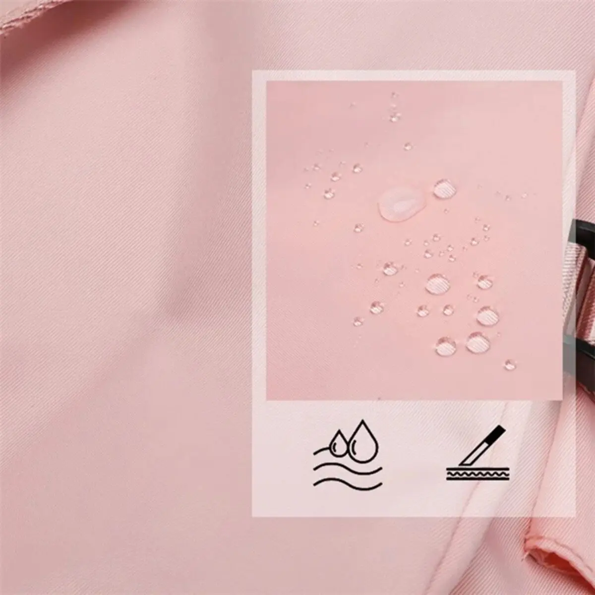 Morral grande de espalda rosa con textura, detalles de gotas de agua y símbolo de resistencia.