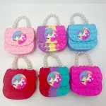 Bolso pop it rosa y morado para niña con diseño de unicornio y perlas.