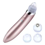 Extractor de puntos negros y espinillas con tecnología de succión, color oro rosa.