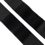 Cinturilla de compresión negra con velcro ajustable para soporte lumbar y abdominal.