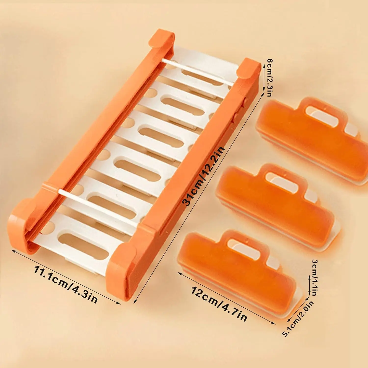 Estante organizador de nevera naranja con clips para bolsas de alimentos, dimensiones 31x6cm.
