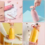 Botella mini licuadora portátil rosa con jugo de naranja en un set de estilo de vida.