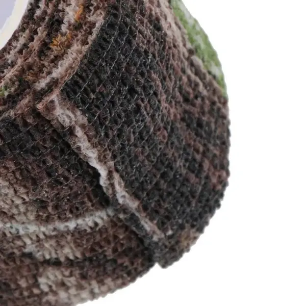 Vendas autoadhesivas camufladas para crossfit, detalle del tejido y patrón para agarre seguro.