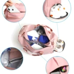 Bolso de viaje o gym impermeable rosa con compartimento para zapatos y bolsillo para celular.