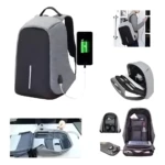 Bolso mochila morral antirobo gris con puerto USB y cargando celular, compartimentos internos.