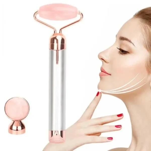 Flawless Contorn: Masajeador antiedad con rodillo de cuarzo rosa vibratorio para el rostro.