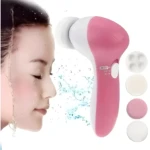Cepillo masajeador facial 5 en 1 rosa, limpiador de piel y exfoliante con accesorios.