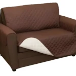 Cubre sofá marrón de 2 puestos, matelaseado y reversible, protege tu mueble.