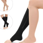 Set x2 pares medias de compresión negras y beige con cremallera abierta al frente.