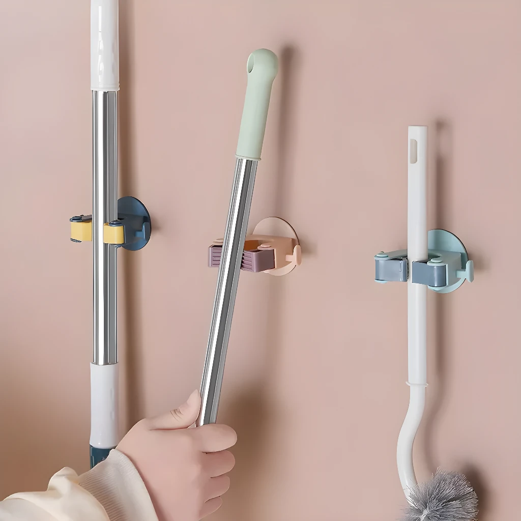 Soporte adhesivo para escobas y traperos, gancho organizador de pared.