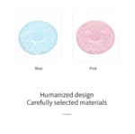 Tapete masajeador facial con diseño de carita feliz en azul y rosa.