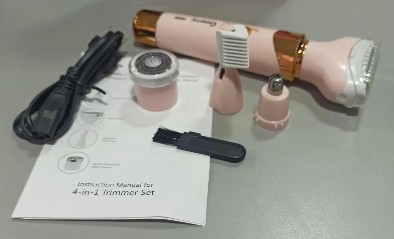 Depiladora recargable mujer 4 en 1 rosa, con accesorios y manual de instrucciones.