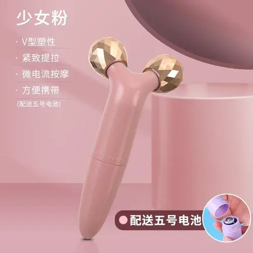 Rodillo masajeador facial rosa con esferas doradas, V-shape, microcorriente y batería.