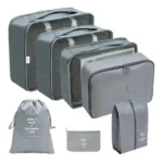Set organizador de maleta para viaje 7 piezas gris, para ropa y zapatos.