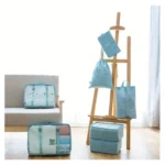 Set organizador de maleta 7 piezas para viaje, color azul claro, con bolsos y cubos de tela.