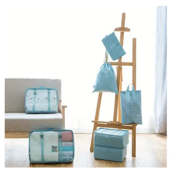 Set organizador de maleta 7 piezas para viaje, color azul claro, con bolsos y cubos de tela.