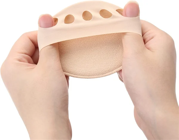 Par de medias puntera antepie beige con separación de dedos.