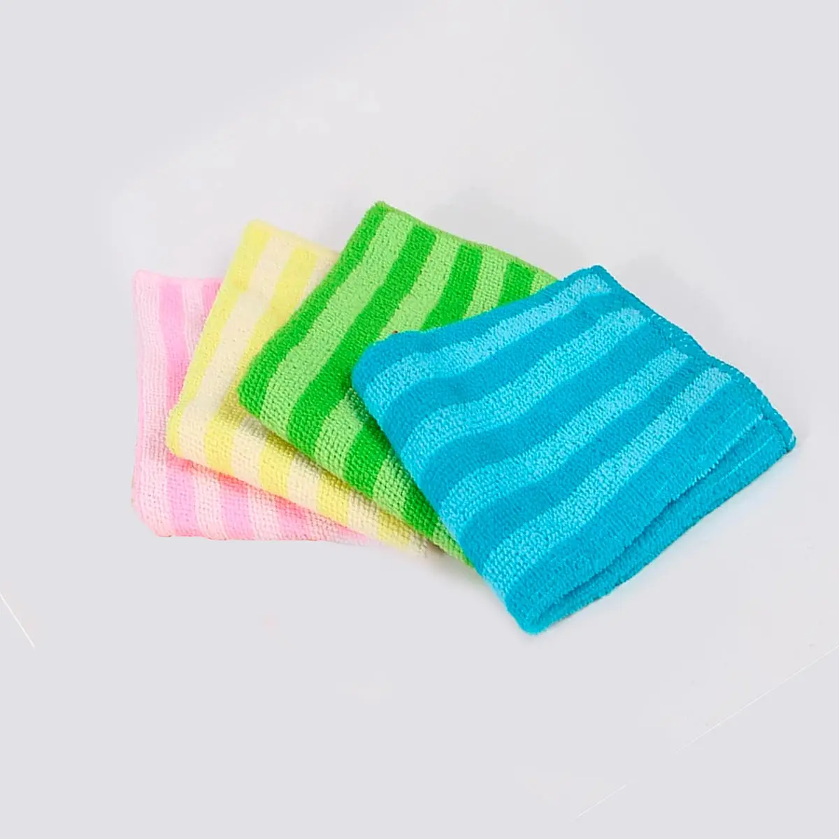 Toallas de microfibra X4 en colores surtidos con rayas: rosa, amarillo, verde y azul.