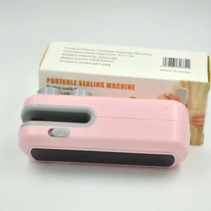Mini sellador de bolsas a calor portátil rosa con detalles en gris, ideal para alimentos.