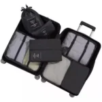 Set de 14 bolsas viajeras negras organizadoras para maleta, con compartimentos.