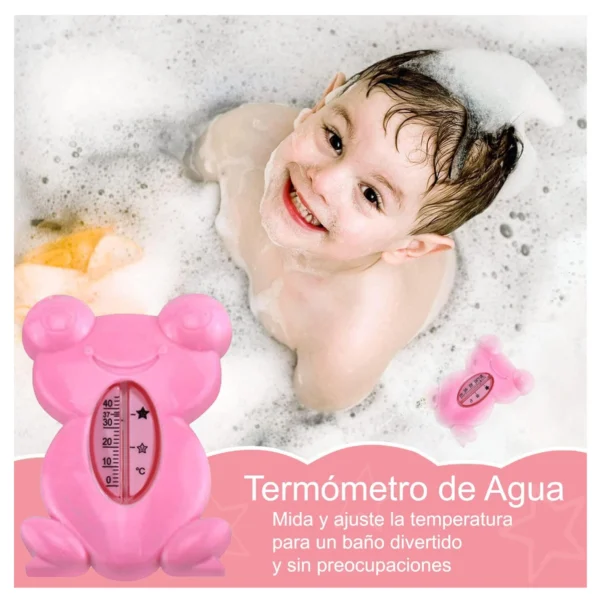 Bebé sonriente en baño de burbujas con termómetro de rana rosa y kit de aseo.
