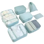 Set de 14 bolsas organizadoras de viaje, para ropa y equipaje, color azul claro.