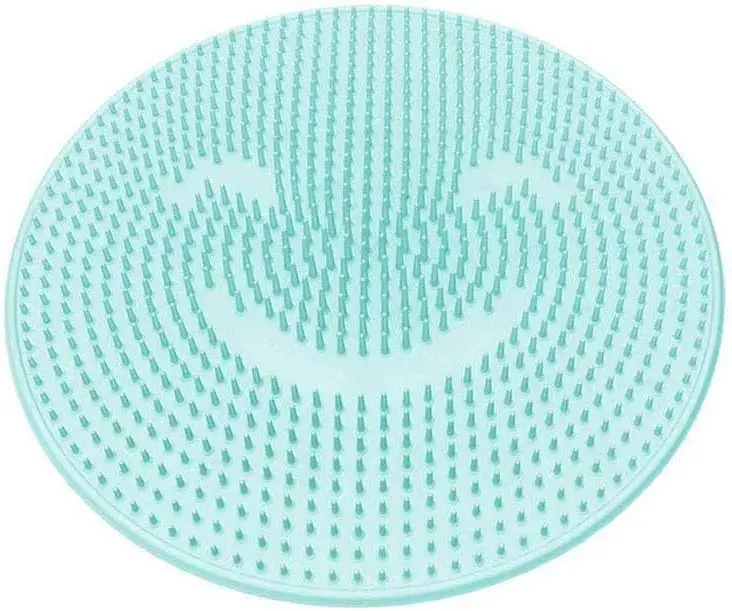 Tapete masajeador redondo color menta con texturas y relieve para aliviar el estrés.