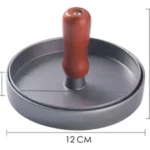 Molde para hamburguesas de metal y mango de madera. Diámetro 12cm, altura 8cm, grosor 2cm.