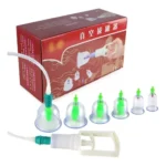 Kit de terapia de ventosas al vacío con copas de diferentes tamaños y bomba de succión manual.