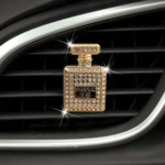 Ambientador para carro con diseño de perfume Channel dorado con diamantes, ideal para ventilación.