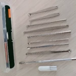 Kit de 10 piezas para limpieza de oídos, extractores metálicos y estuche.