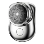 Mini afeitadora eléctrica portátil plateada, ideal para viajes.