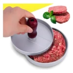 Molde para carne de hamburguesa con base y prensa manual, listo para formar hamburguesas jugosas.