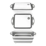 Tabla multifuncional plegable con escurridor, gris y blanco.