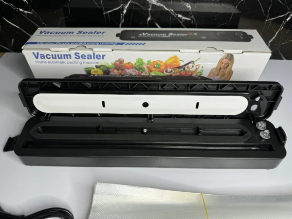 Selladora al vacío para hogar con 100 bolsas; electrodoméstico de cocina eficiente y moderno.